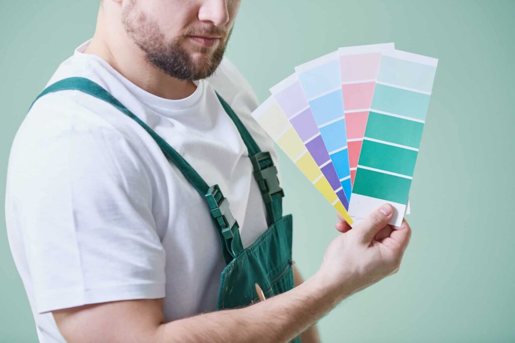 Man holding color swatches.jpg